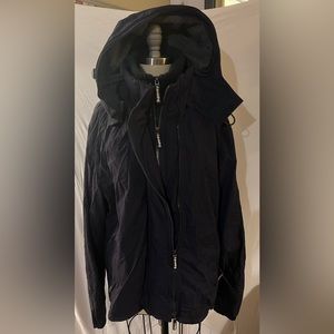 Superdry. Men’s large but fits medium. Navy blue and gray fleece inside.